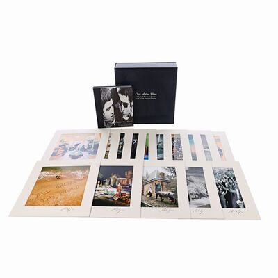 Lot #589: OASIS - Deluxe Edition of Out of the Blue, The Oasis Photographs Book, With 15 Signed Photos