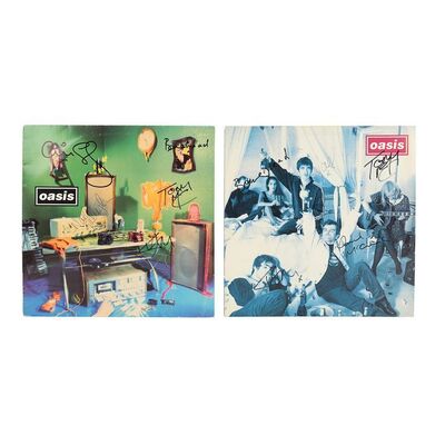 Lot #594: OASIS - "Cigarettes & Alcohol" and "Shakemaker" Autographed 12'' Vinyls