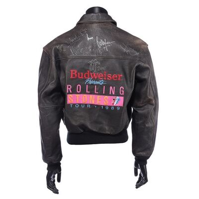 Lot #616: THE ROLLING STONES - Bill Wyman's Tour Jacket Autographed by Mick Jagger, Bill Wyman, Charlie Watts and Ronnie Wood