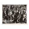 Lot #744: STAR WARS: VARIOUS PRODUCTIONS - Anthony Daniels Collection: Autographed Black-and-white Photo of C-3PO (Anthony Daniels) and the London Symphony Orchestra