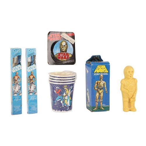 Lot #766: STAR WARS: ORIGINAL TRILOGY (1977 - 1983) - Anthony Daniels Collection: Vintage C-3PO Soap, Toothbrushes, Paper Cups and Light-up Badge
