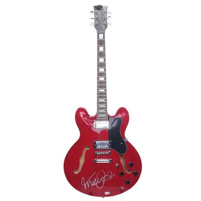 Lot #871: BACK TO THE FUTURE (1985) - Michael J. Fox-autographed Replica Prop Guitar