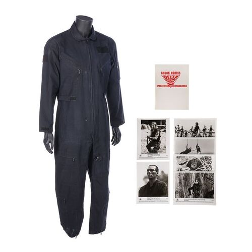 Lot #1016: DELTA FORCE 2 (1990) - Colonel Scott McCoy's (Chuck Norris) Jumpsuit, Promotional Stills and Information Booklet