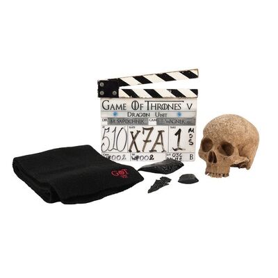 Lot #1120: GAME OF THRONES (TV SERIES, 2011-2019) - Three-eyed Raven Cave Skull, Arrowhead, Dragonglass Pieces, Season 5 Clapperboard and Crew Scarf