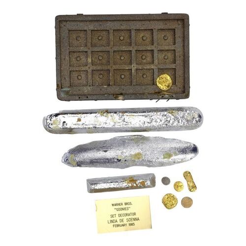 Lot #1147: THE GOONIES (1985) - Set of One-Eyed Willy's Coins and Treasure with Set Decorator Plaque