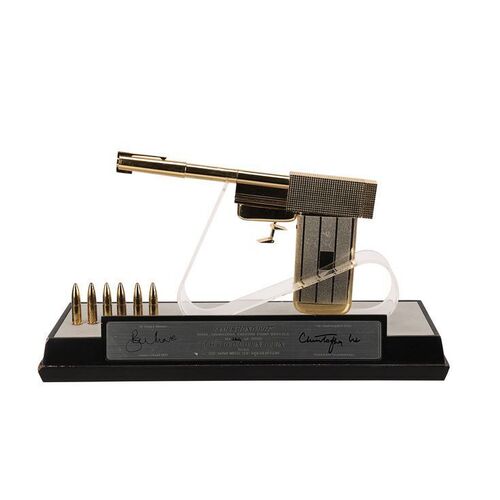 Lot #1253: JAMES BOND: THE MAN WITH THE GOLDEN GUN (1974) - Factory Entertainment Sir Roger Moore and Sir Christopher Lee Autographed Limited Edition Replica Golden Gun