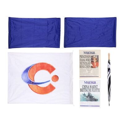 Lot #1282: JAMES BOND: TOMORROW NEVER DIES (1997) - Peter Nelson Collection: German Newspaper, CMGN Flags and Umbrella