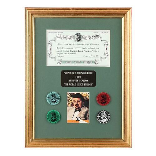 Lot #1286: JAMES BOND: THE WORLD IS NOT ENOUGH (1999) - Elektra King's (Sophie Marceau) Cheque and Zukovsky (Robbie Coltrane) Casino Chips Display