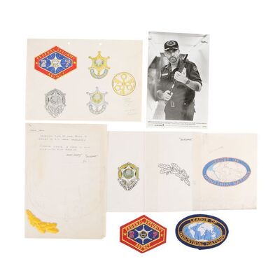 Lot #1451: OUTLAND (1981) - Hand-drawn John Mollo Concepts for Marshall O'Niel's (Sean Connery) Badges and Patches