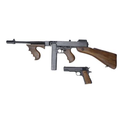 Lot #1483: PUBLIC ENEMIES (2009) - John Dillinger's (Johnny Depp) Stunt Tommy Gun and Handgun