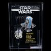 Lot #1621: STAR WARS TOYS - Canadian Unpunched 18 Back Walking Wind-up R2-D2 AFA 80 NM