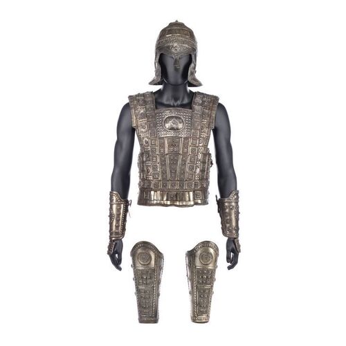 Lot #1720: TROY (2004) - Paris' (Orlando Bloom) Stunt Breastplate and Bracers with Trojan Helmet and Greaves