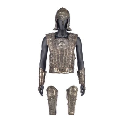 Lot #1720: TROY (2004) - Paris' (Orlando Bloom) Stunt Breastplate and Bracers with Trojan Helmet and Greaves