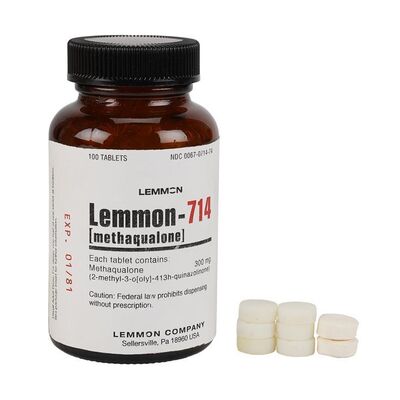 Lot #1768: THE WOLF OF WALL STREET (2013) - Lemmon-714 Quaalude Bottle with Tablets and Eight Separate Close-up Tablets