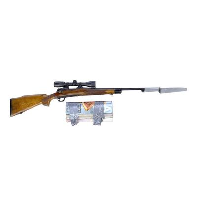 Lot #1777: WORLD WAR Z (2013) - Gerry Lane's (Brad Pitt) Stunt Hunting Rifle with Magazine Arm Guard