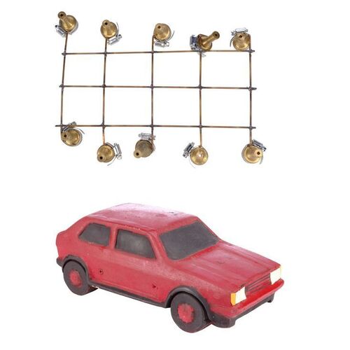Lot # 25: Miniature Car with Water Hose Grid