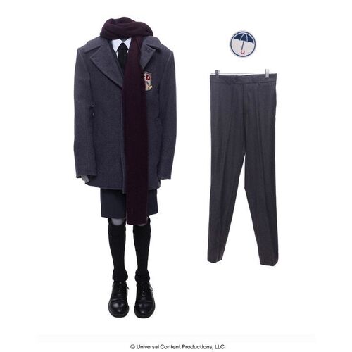 Lot # 6: The Umbrella Academy (2019-2024): Young Klaus Hargreeves's (Dante Albidone) Umbrella Academy Uniform with additional Uniform Pants and Tattoo Sticker