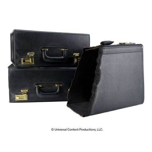 Lot # 85: The Umbrella Academy (2019-2024): Commission Time Travel Briefcase with Bullet-ridden and SFX Vortex Briefcases