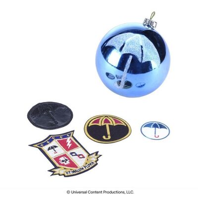 Lot # 223: The Umbrella Academy (2019-2024): Umbrella Academy Title Card Ornament Prototype with Tattoo and Patches