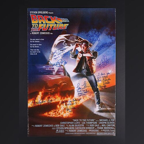 Lot #34 - BACK TO THE FUTURE (1985) - Michael J. Fox, Christopher Lloyd, Tom Wilson, Lea Thompson, Claudia Wells, Frances Lee McCain, James Tolkan, Harry Waters Jr. and Donald Fullilove Autographed Poster