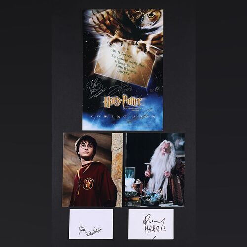 Lot #147 - HARRY POTTER AND THE PHILOSOPHER'S STONE (2001) - Richard Harris and Daniel Radcliffe Autographs, Stills and Mini Poster Signed by Warwick Davis, James Phelps, Oliver Phelps and Peter Burroughs