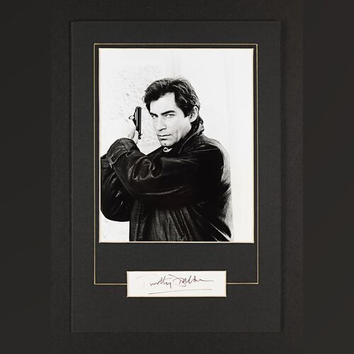 Lot #215 - JAMES BOND: THE LIVING DAYLIGHTS (1987) - Timothy Dalton Autographed Mounted Display