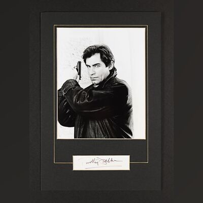 Lot #215 - JAMES BOND: THE LIVING DAYLIGHTS (1987) - Timothy Dalton Autographed Mounted Display