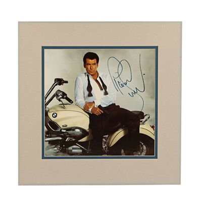 Lot #217 - JAMES BOND: TOMORROW NEVER DIES (1997) - Pierce Brosnan Autographed Photo, 1997