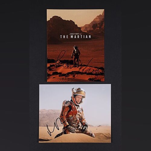 Lot #269 - THE MARTIAN (2015) - Matt Damon and Ridley Scott Autographed Mini Poster and Publicity Still