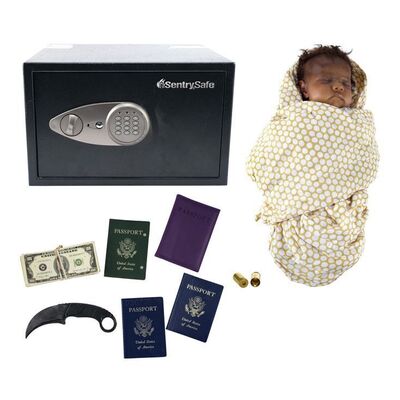 Lot #492 - Baby Marcus Stand-In Puppet with Lt. Mike Lowrey's (Will Smith) Safe and Armando Aretas' (Jacob Scipio) Stunt Karambit ### BAD BOYS FOR LIFE (2020)