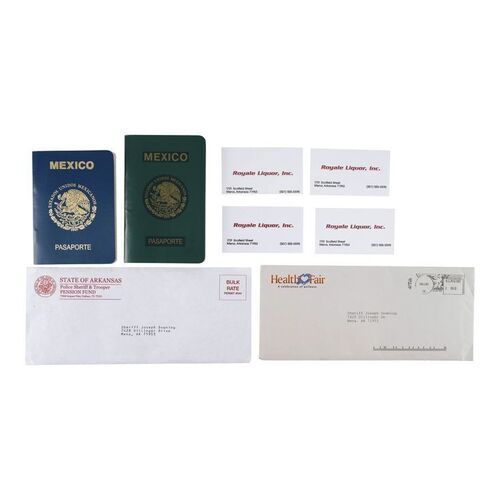 Lot #1123 - Barry Seal's (Tom Cruise) "Royale Liquor" Business Cards and Fake Passports with Sheriff Downing's (Jesse Plemons) Mena Letters ### AMERICAN MADE (2017)