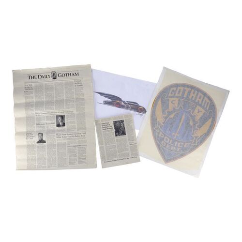 Lot #1144 - Production-Made Printed Batmobile Art, Gotham Police Decal, and "The Daily Gotham" Newspaper Clippings ### BATMAN FOREVER (1995)