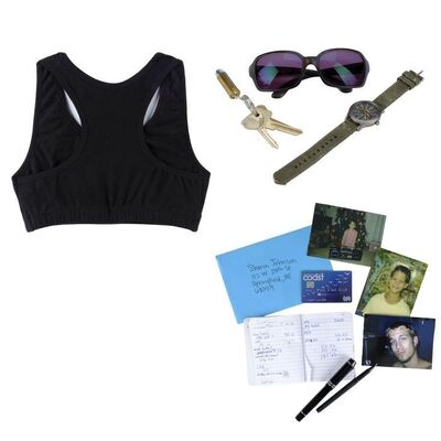 Lot #1184 - Lynsey's (Jennifer Lawrence) Framed Sports Bra with Notebook, Pens, Watch, Keys, and Sunglasses ### CAUSEWAY (2022)