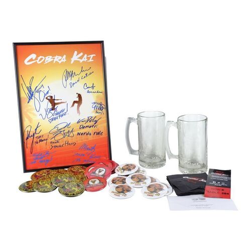 Lot #1201 - Cast-Autographed Premiere Poster with Buttons, Screening Ticket, Napkins, and Crew Gifts ### COBRA KAI (2018-2023)