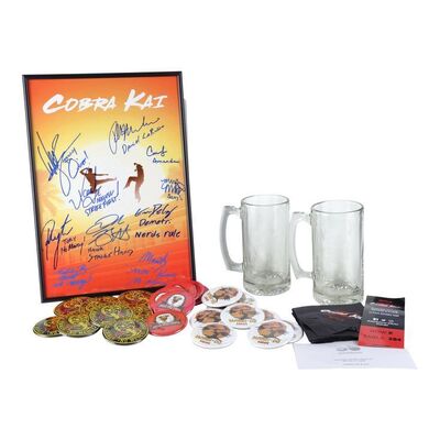 Lot #1201 - Cast-Autographed Premiere Poster with Buttons, Screening Ticket, Napkins, and Crew Gifts ### COBRA KAI (2018-2023)