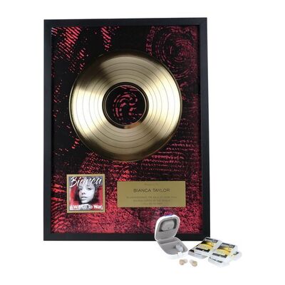 Lot #1209 - Bianca Creed's (Tessa Thompson) Hearing Aid and Record Sale Award ### CREED III (2023)