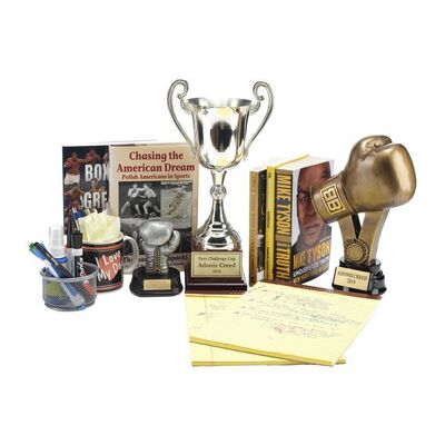 Lot #1211 - Set of Three Adonis Creed's (Michael B. Jordan) Trophies and Office Ephemera ### CREED III (2023)