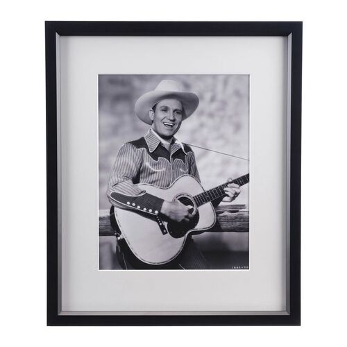 Lot #1272 - Framed Publicity Photograph of Gene Autry ### GENE AUTRY