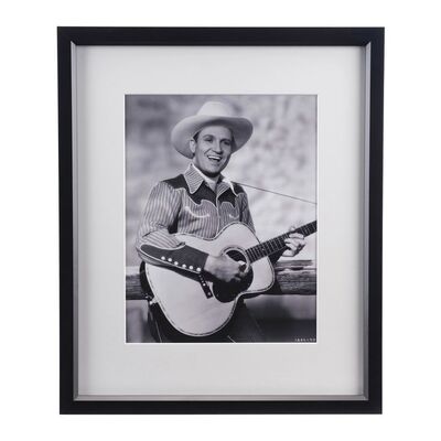 Lot #1272 - Framed Publicity Photograph of Gene Autry ### GENE AUTRY