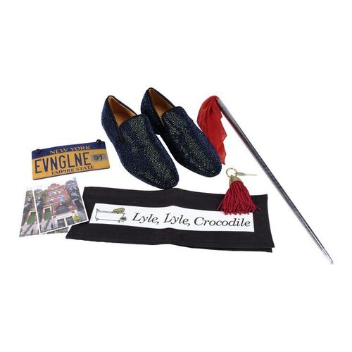 Lot #1386 - Hector P. Valenti's (Javier Bardem) Magic Cane, Key, Chairback, License Plate and Blue Shoes ### LYLE, LYLE, CROCODILE (2022)