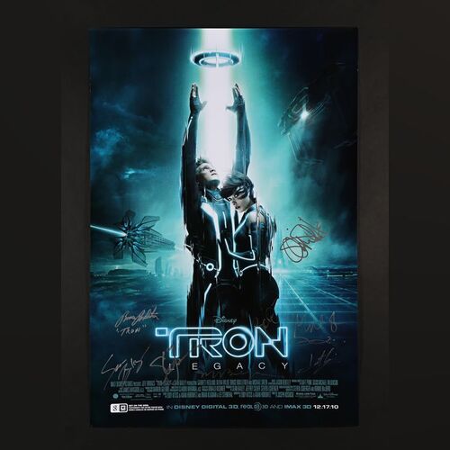 392. Jeff Bridges, Olivia Wilde, Garrett Hedlund, Michael Sheen, Joseph Kosinski, Bruce Boxleitner and Others Autographed One-Sheet, 2010 ### TRON: LEGACY (2010)