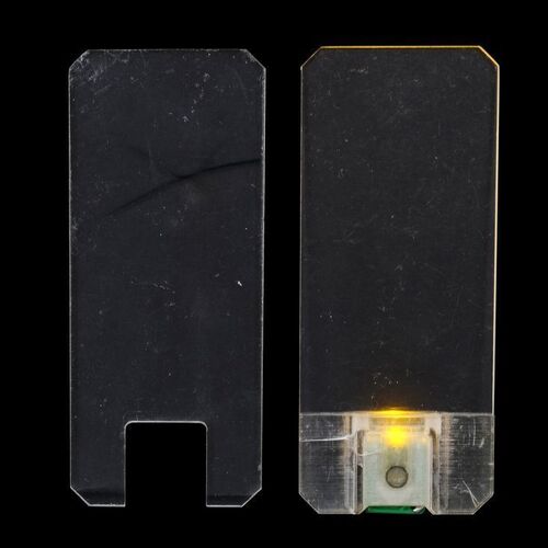 Lot # 21: The Expanse (2015-2022): Josephus Miller's (Thomas Jane) Light-up Belter Comm and Damaged Comm Devices