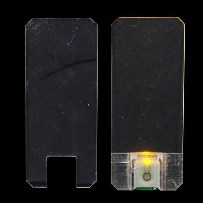 Lot # 21: The Expanse (2015-2022): Josephus Miller's (Thomas Jane) Light-up Belter Comm and Damaged Comm Devices