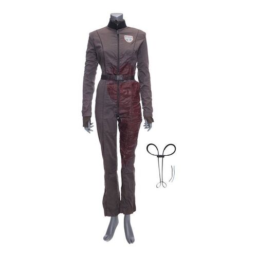 Lot # 87: The Expanse (2015-2022): Camina Drummer's (Cara Gee) Bloody Jumpsuit with Jacket and Restraints