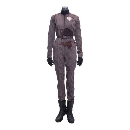 Lot # 147: The Expanse (2015-2022): Camina Drummer's (Cara Gee) Bloody Jumpsuit with Jacket Accessory and Hero Light-up Boots