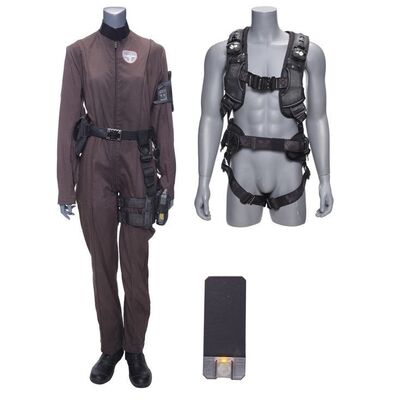 Lot # 244: The Expanse (2015-2022): Sakai's (Bahia Watson) Coveralls with Light-up Boots, Harness, Pistol, and Accessories