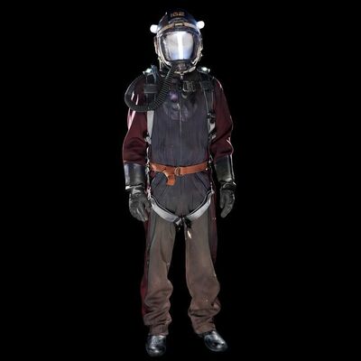 Lot # 299: The Expanse (2015-2022): Tynan Ship Belter Complete Spacesuit with Helmet, Pack, Harness and Light-up Boots