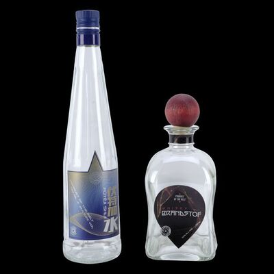 Lot # 312: The Expanse (2015-2022): Amos Burton (Wes Chatham) and Roberta "Bobbie" Draper's (Frankie Adams) Booze Bottles on Ceres Station