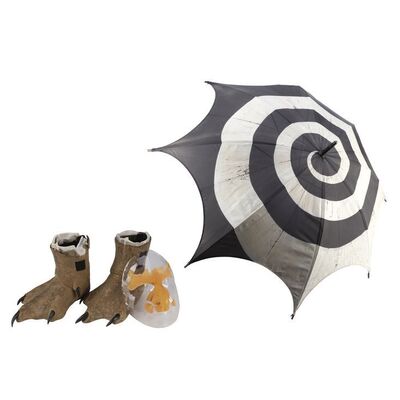 34. The Penguin's (Danny DeVito) "Swirl" Umbrella with Face Appliance and Penguin Army Feet ### BATMAN RETURNS (1992)