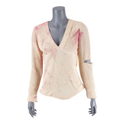 60. Bonnie Parker's (Faye Dunaway) Screen-Matched Bloodied Shirt ### BONNIE AND CLYDE (1967)